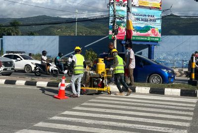 Empreza Bandidu Qualidade hahú pinta zebra cross iha kapitál Dili